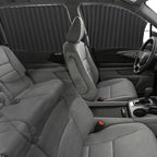 Gray car interior with front seats and dashboard