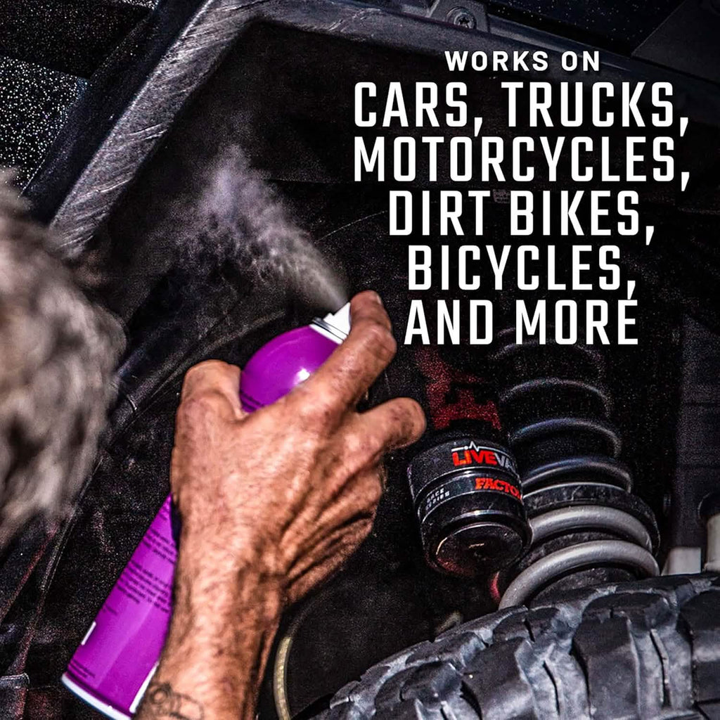 Person using a spray can on a vehicle suspension system with text about product compatibility.
