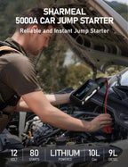Person using a Sharmeleal 5000A car jump starter to start a vehicle's engine.