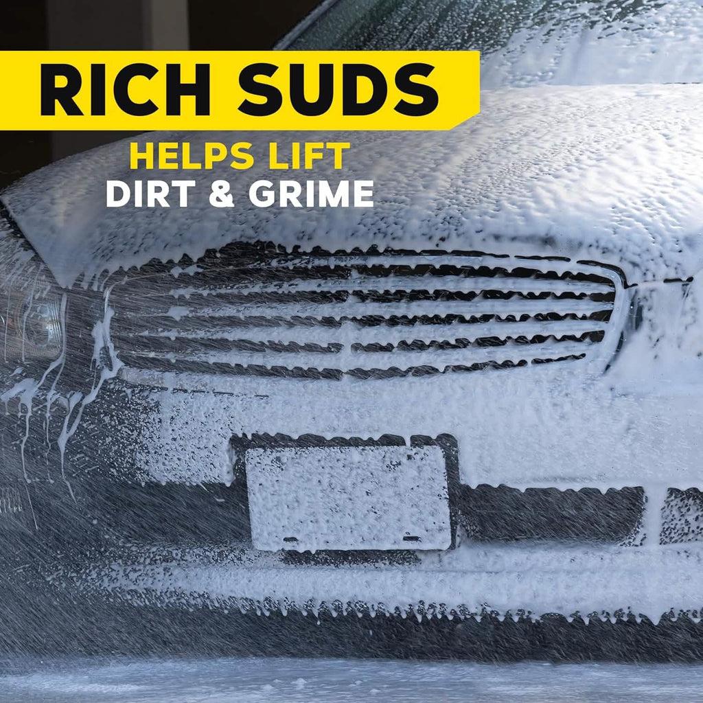 Car with soapy suds on a black background with text 'Rich Suds Helps Lift Dirt & Grime'.