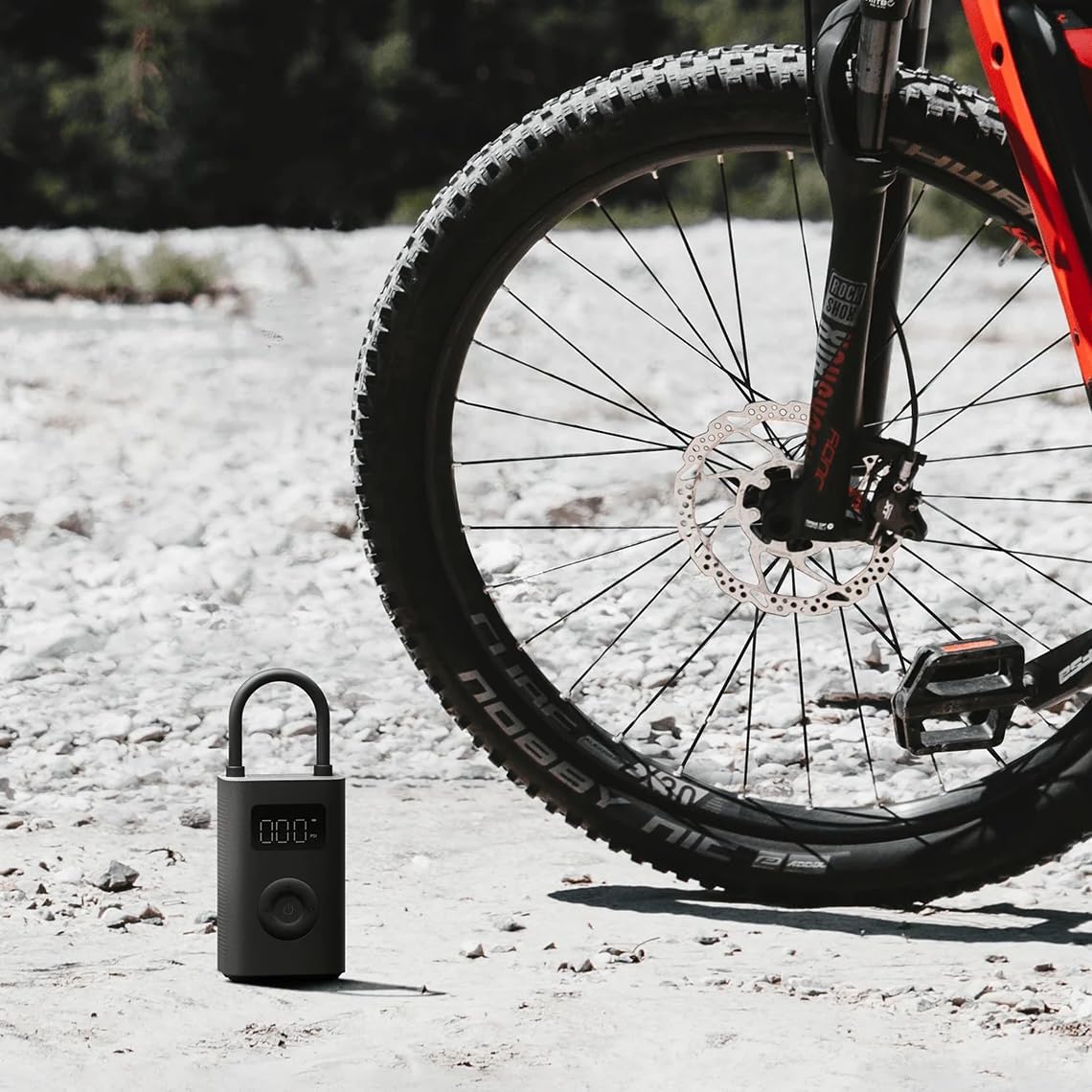 Bicycle tire with a digital lock on a gravel surface