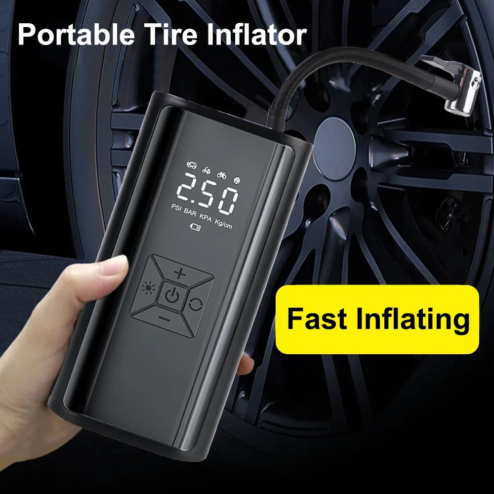 Portable tire inflator with digital display held by a hand, next to a car tire.