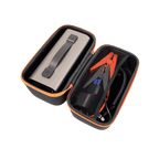 Portable jump starter kit with battery and cables in a black carrying case on a white background