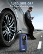 Blue car jump starter on a road with a person using a phone, and text about auto shut-off feature.